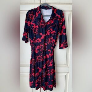 NWOT Reborn medium/large dress. Blue with red flowers. Waist tie.